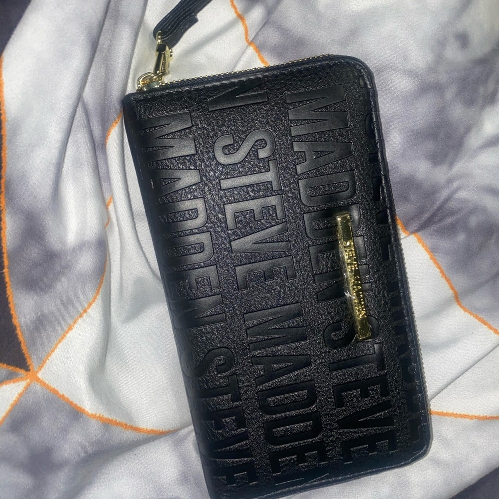 Black Steve Madden wallet with wrist strap